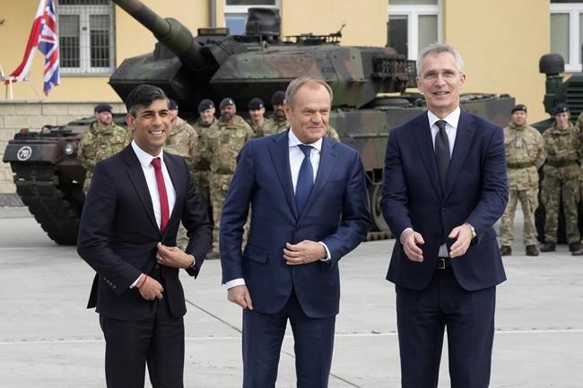 UK pledges a major increase in defense spending as it gives Ukraine $620 million in new military aid
