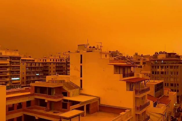 Saharan dust turns the sky of Athens, Greece orange