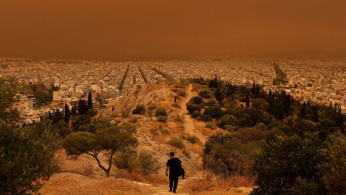 Greece: Athens turns orange as Sahara dust storm sweep across city I VIDEO