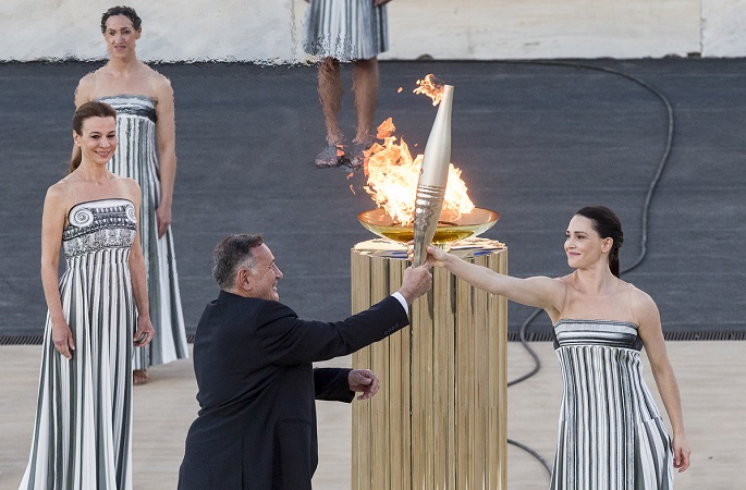 Paris 2024 Olympic flame begins journey to France