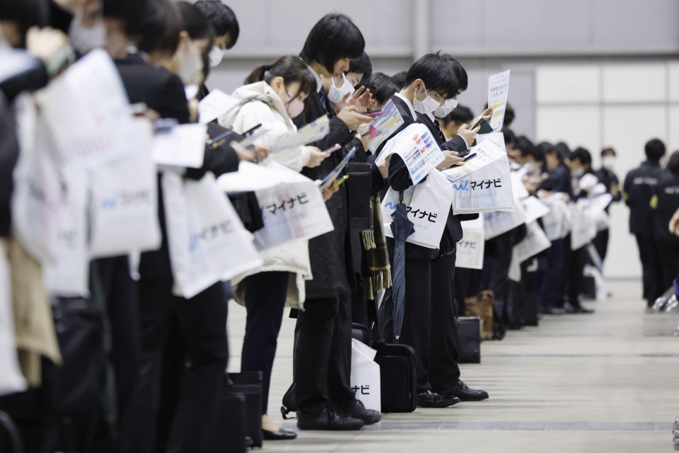 Japan's March jobless rate remains unchanged at 2.6%
