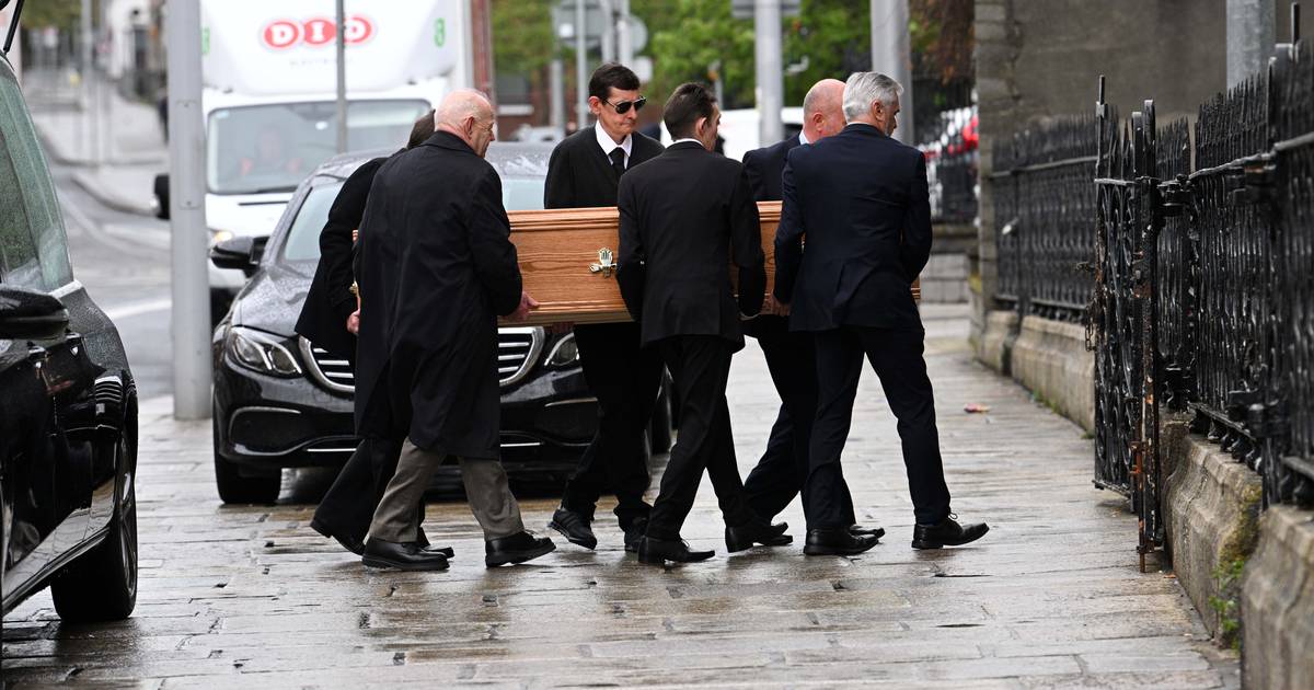 Godfather theme played as remains of Tony Felloni taken from church after Dublin funeral