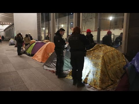 Paris Police evict migrants from makeshift camp in action decried as &#39;social cleansing&#39;