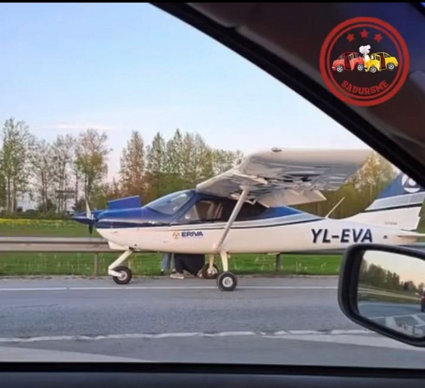 Small plane makes emergency landing on highway in Latvia