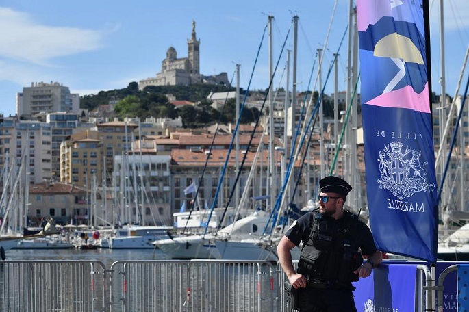 Olympic flame arrives in Marseille, starts coastal parade