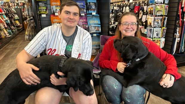 Good dogs! How Bingo and Doug helped this Sask. teen earn the diploma no one thought he would