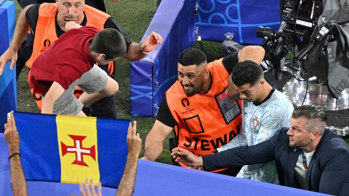 WATCH: Portugal's Cristiano Ronaldo Narrowly Avoids Fan Who Jumped from Crowd After Defeat to Georgia