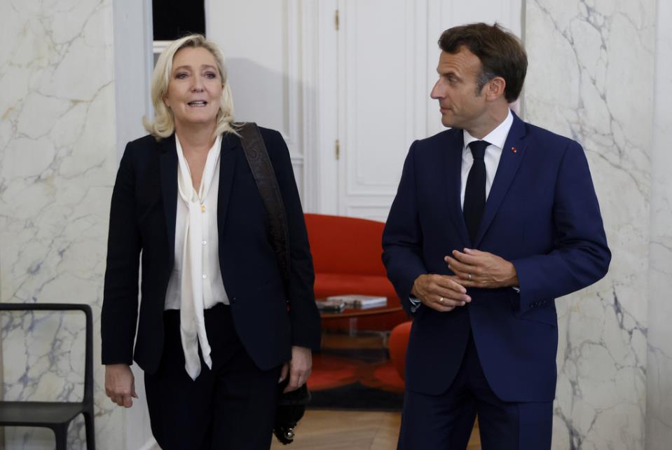 France's exceptionally high-stakes election has begun; the far right leads pre-election polls