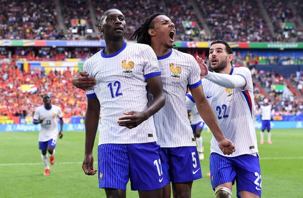 Deflected goal sees France book Euro quarter-final spot