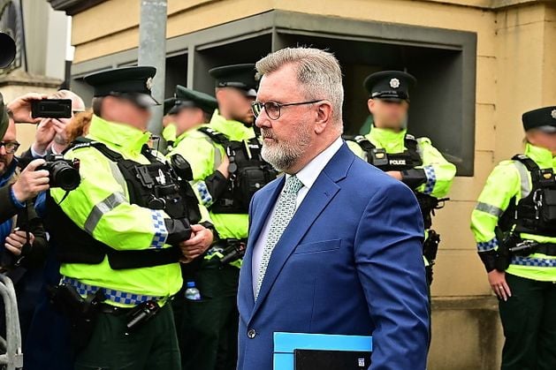 Sporting a grey goatee beard and minus his Christian fish badge, Jeffrey Donaldson returns to the public eye
