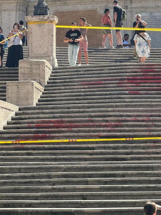 Feminists splash red paint on Rai HQ in femicide protest