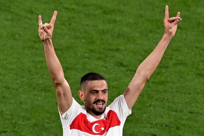 Germany summons Turkish envoy over Euro player's far-right sign