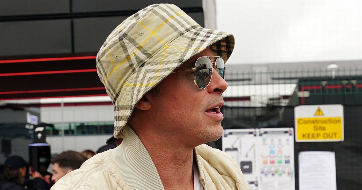 Brad Pitt, 60, hailed as 'real-life Benjamin Button' as fans gobsmacked by youthful look at Silverstone