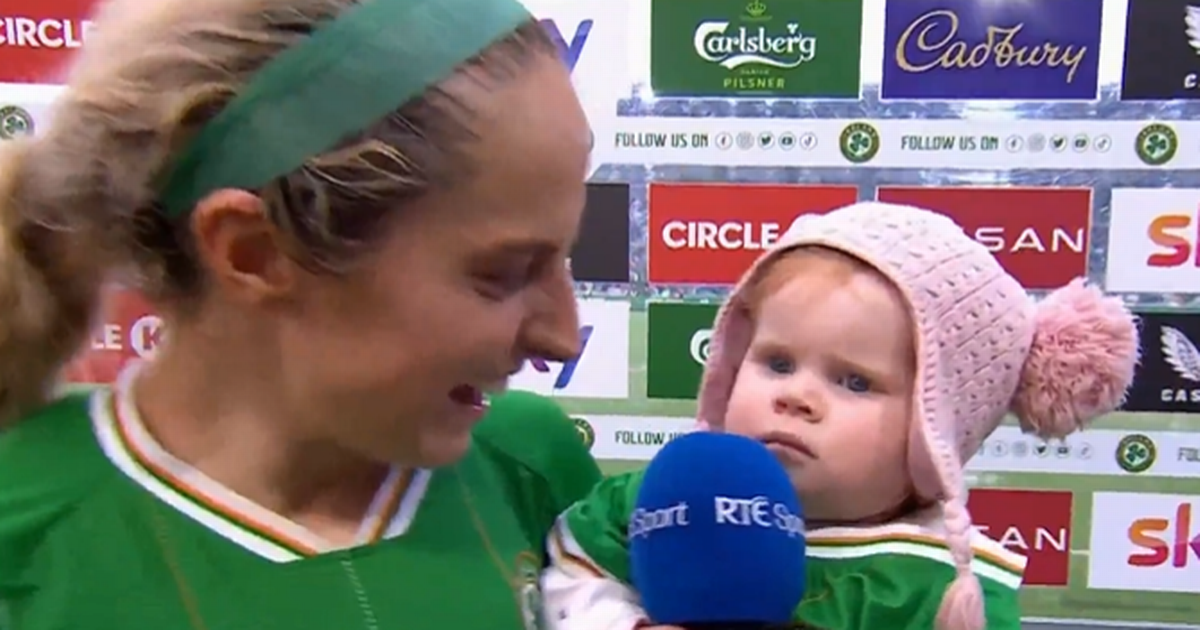 Baby Rosie steals the show during RTE interview with her mother Julie-Ann Russell after Ireland's win over France
