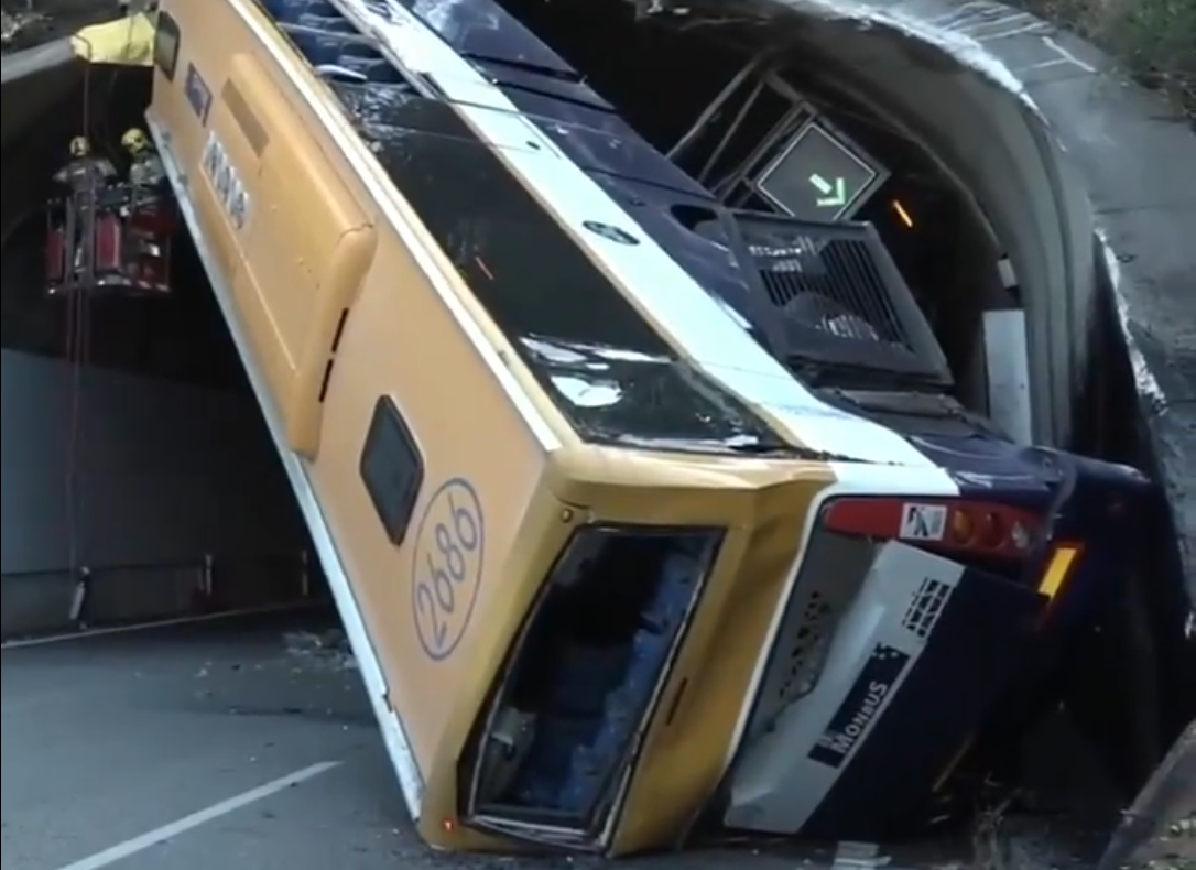 Fifty people left injured after coach carrying Inditex employees smashes into tunnel mouth, becoming vertically wedged in entrance