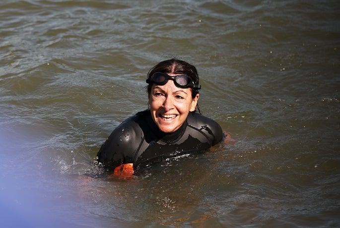 Paris mayor swims in Seine to prove it is clean enough for Olympic