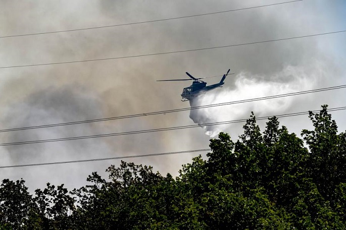 Wildfires rage across southern Europe amid persistent heatwave