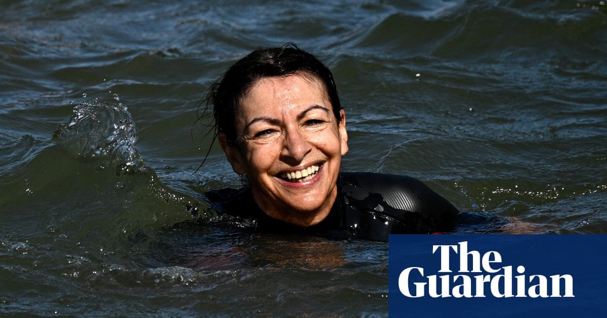Paris mayor swims in Seine as river is cleaned up just in time for Olympics