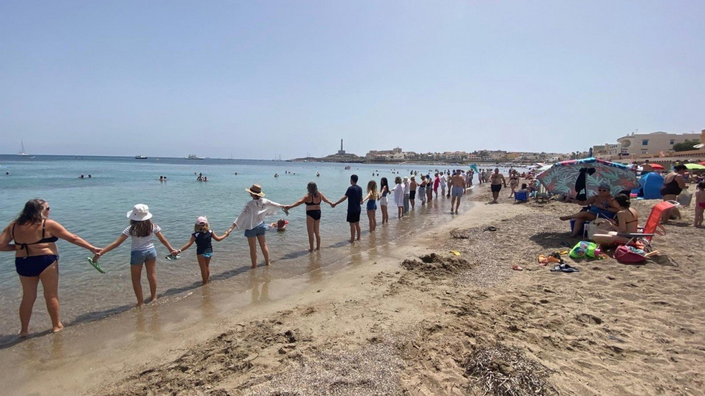 Protesters in Spain form human chains on beaches over controversial housing law
