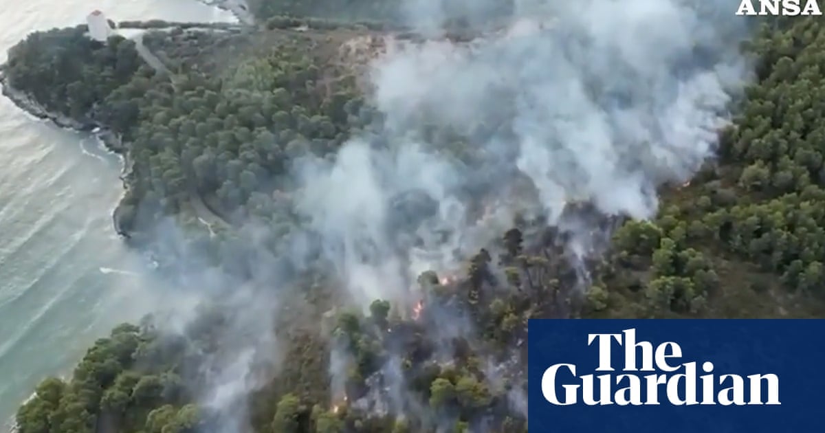 Tourists evacuated from Italian camping village as wildfire spreads