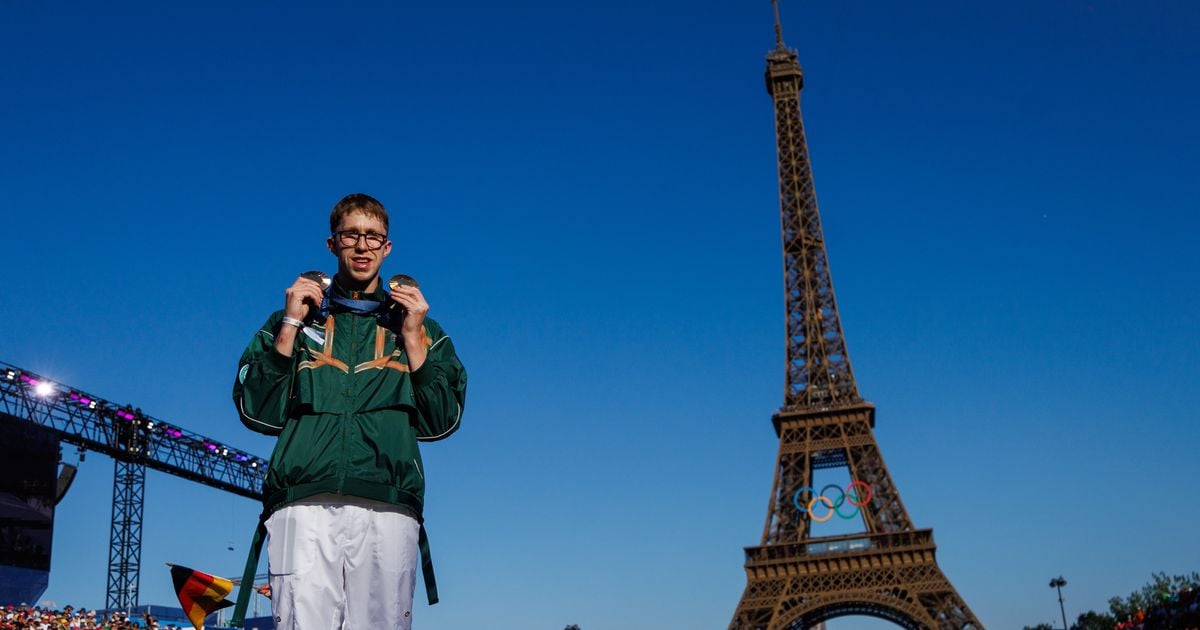 Daniel Wiffen shows off his medals as swimming hero unveils Olympic goodies