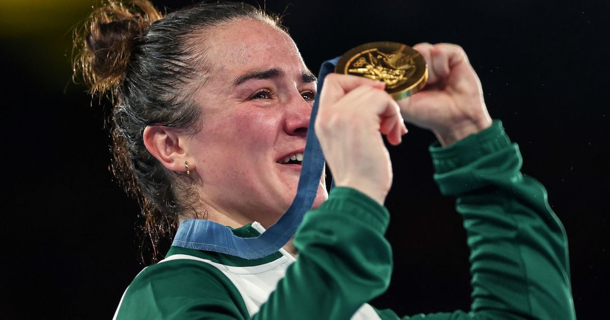 In pictures: Kellie Harrington celebrates with gold medal on podium after Olympic win