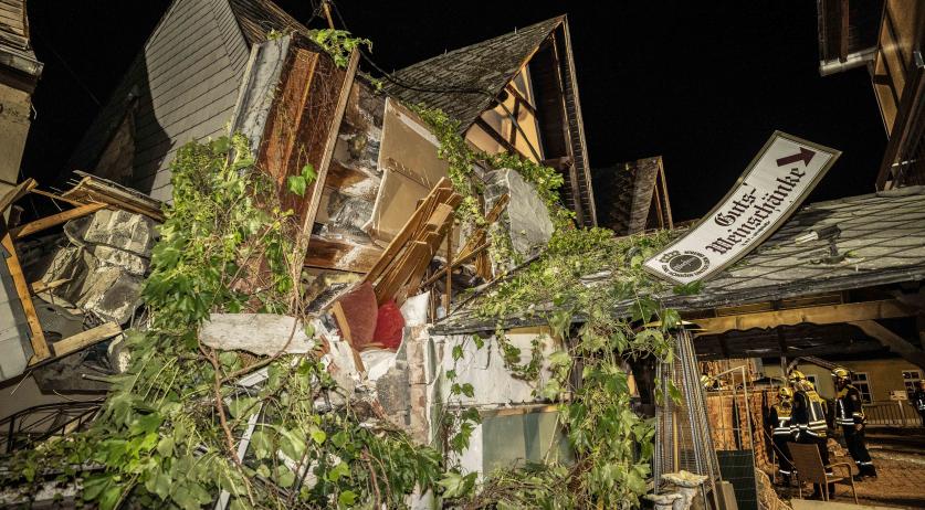 Dutch woman & child rescued from rubble of collapsed German hotel; Father still trapped