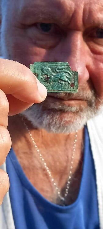 Archaeologists Find Bronze Belt Applique With Relief Image of Lion at Perperikon Site