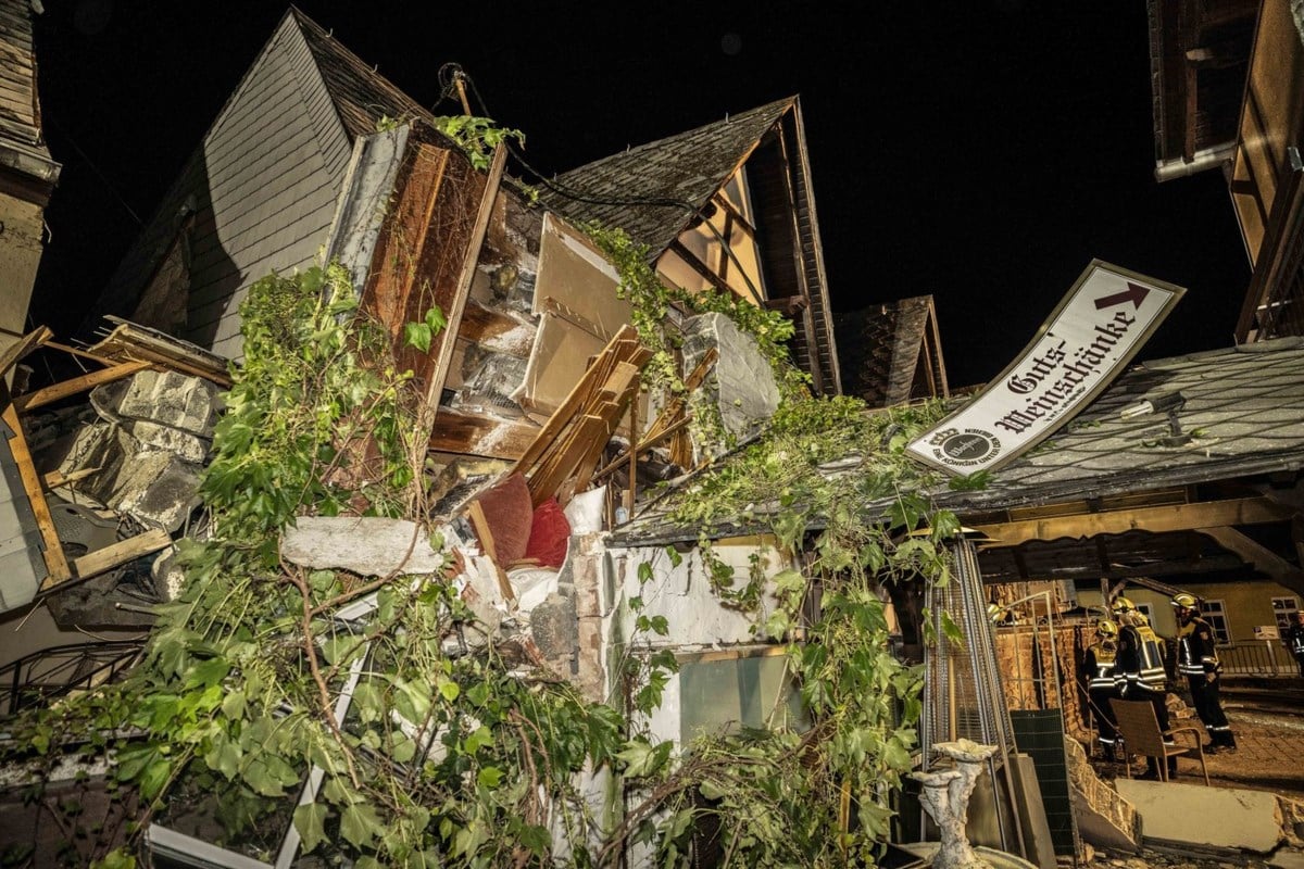 1 person dead and 8 believed trapped after part of a hotel on Germany's Mosel River collapses