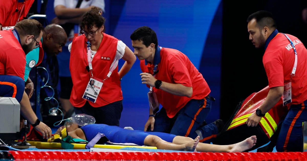 Olympic swimmer collapses poolside after women's 200-meter race