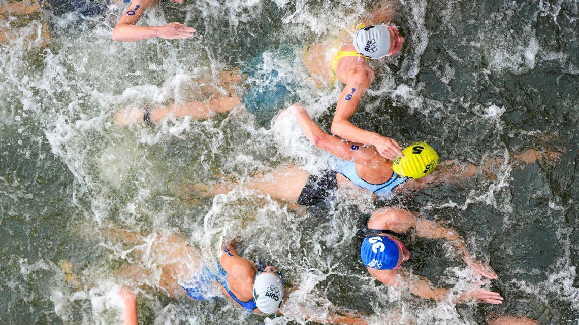 Triathlete says virus made her sick after swim in Seine River