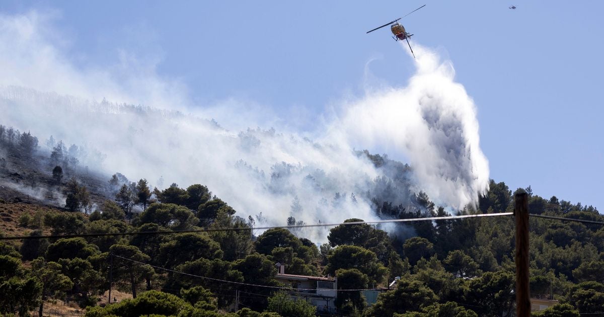 Large wildfire breaks out on Greek holiday island as residents evacuated