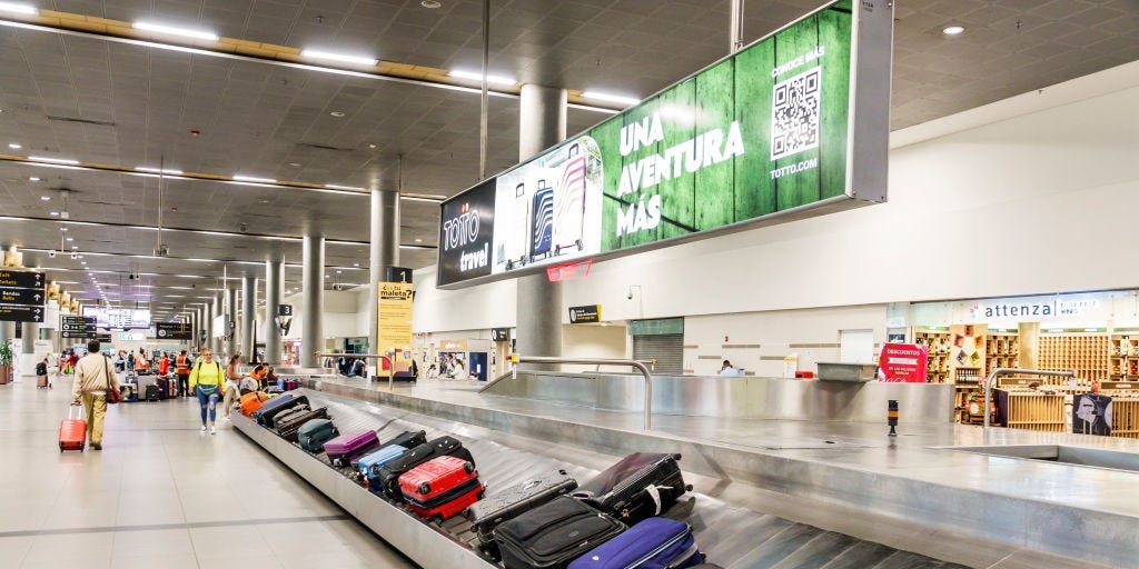 A woman died after getting trapped in a baggage carousel at Chicago O'Hare Airport