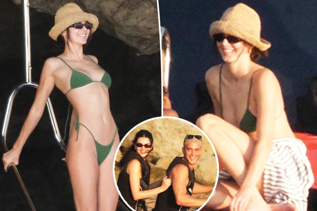 Kendall Jenner flaunts model physique with tiny string bikini