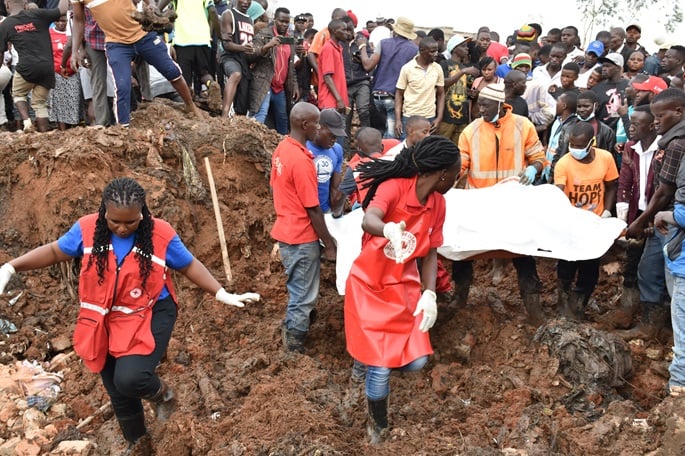 Death toll of garbage dump landslide in Uganda climbs to 18