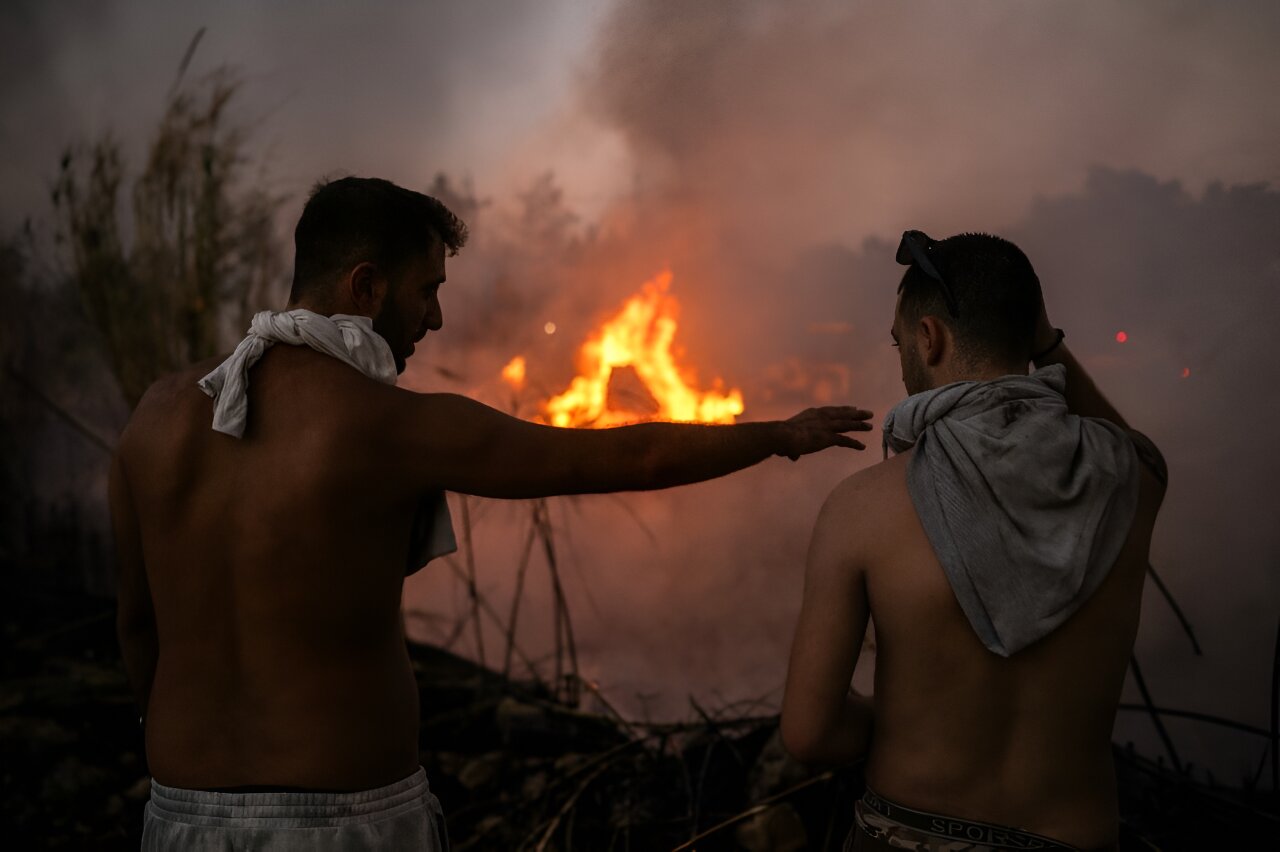 Greek firefighters calm deadly Athens inferno