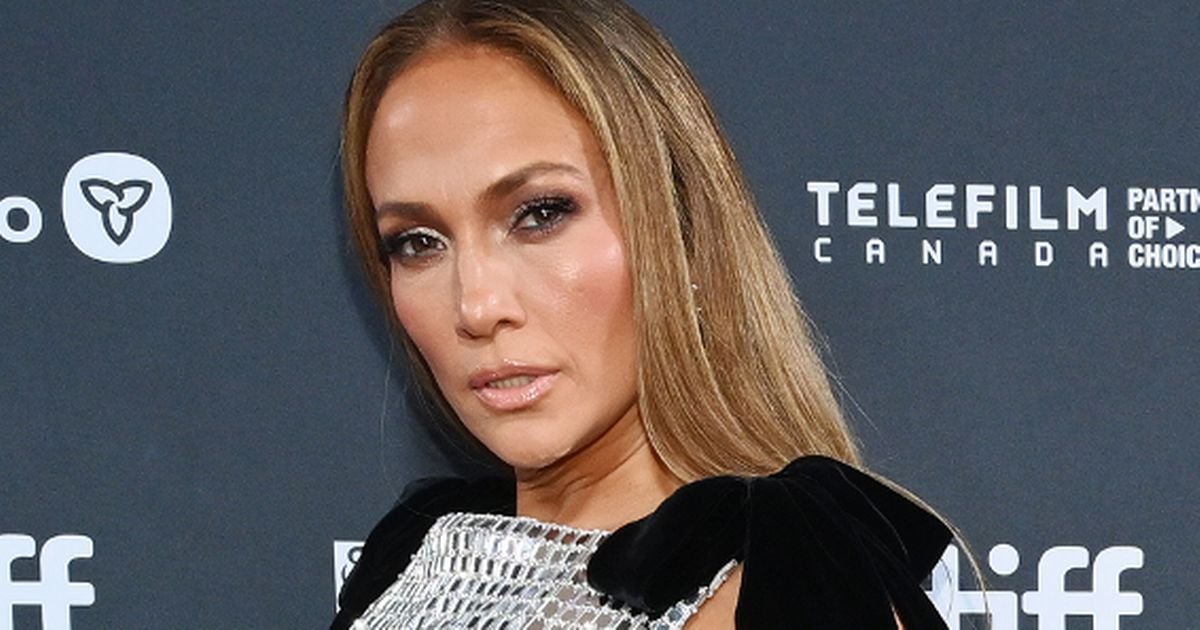 J-Lo shows Ben Affleck what he's missing in racy dress at film premiere as exes avoid awkward run-in