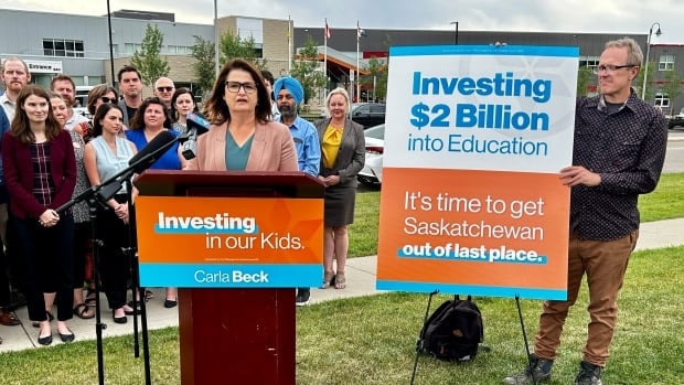 Beck kicks off campaign with a bat and a $2B promise