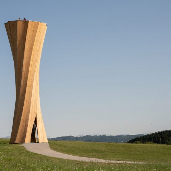 University of Stuttgart uses self-shaping timber and woven flax for tower and pavilion