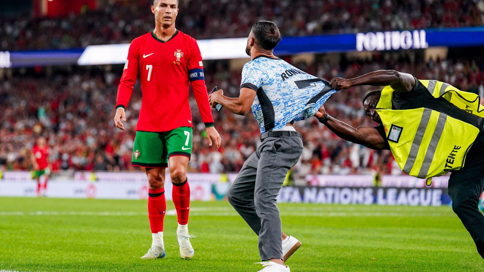 Footage shows Cristiano Ronaldo being targeted by pitch invader at worst possible time