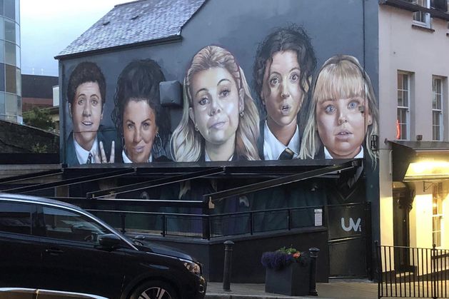 Derry Girls mural bar owner silent on criticism of new structure that partially obscures iconic artwork