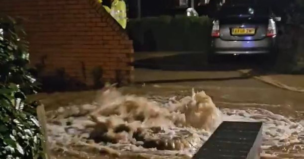 Sudden downpours in Midlands town leaves football stadium submerged and water gushing out of sewers