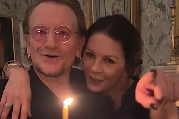 Bono serenades Michael Douglas and Catherine Zeta-Jones on shared birthday in Dublin 