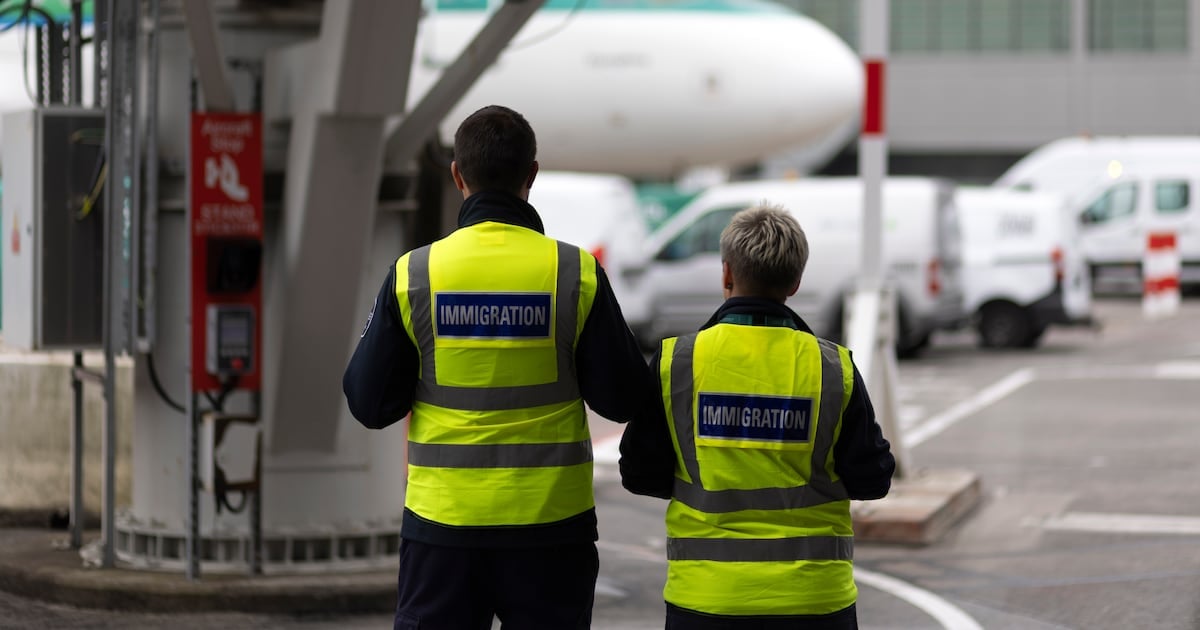 Checking passports with immigration control at Dublin Airport