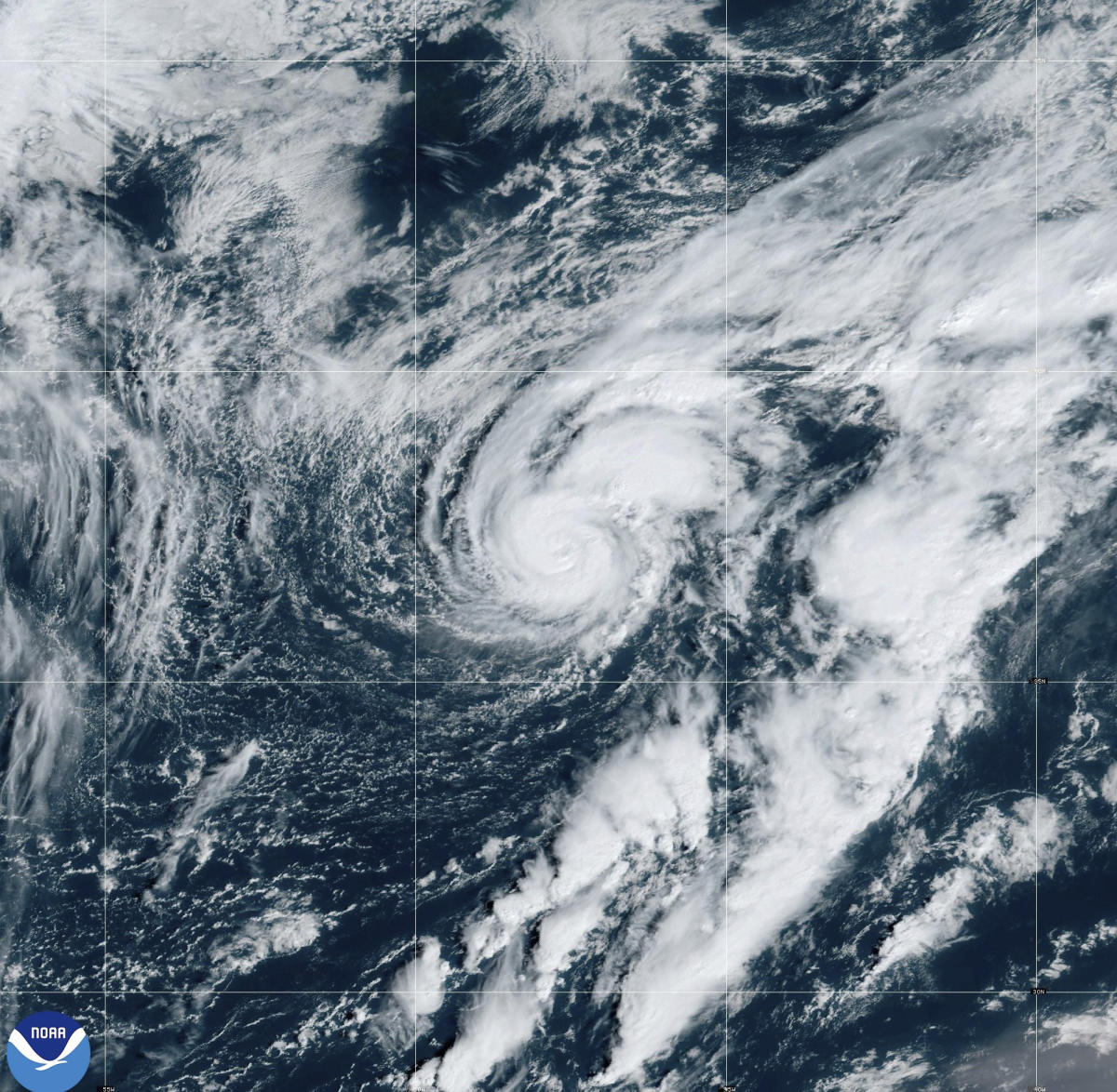 Hurricane Isaac and Tropical Storm Joyce get stronger in the Atlantic, far from land