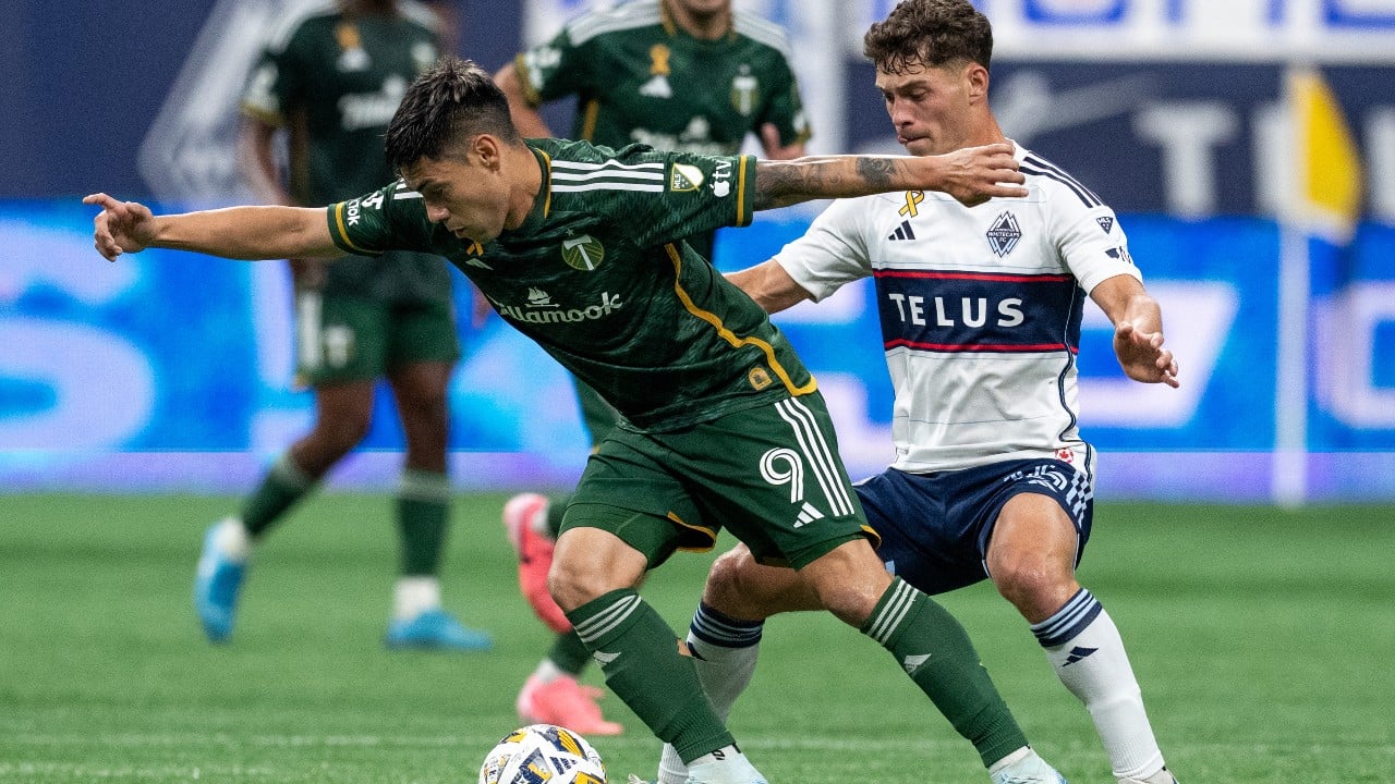 Whitecaps tie Timbers, clinch playoff berth