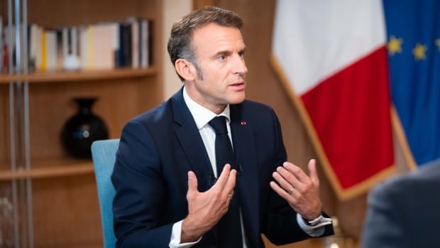 France's Macron says leaders shouldn't 'abandon their values' in the face of bad polls