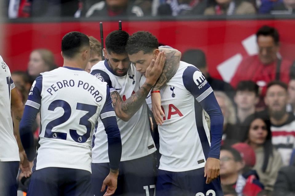 Man United fans leave early and boo the players after 3-0 humbling at home to Tottenham