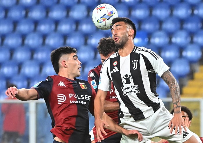 Juventus beat Genoa to return top of Serie A