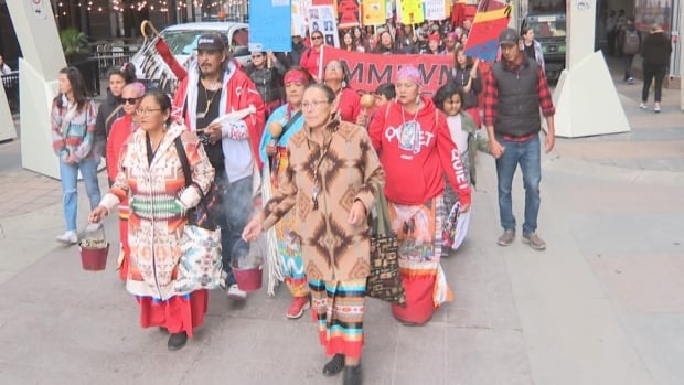 Dozens gather for 21st annual Awo Taan Sisters In Spirit walk and vigil